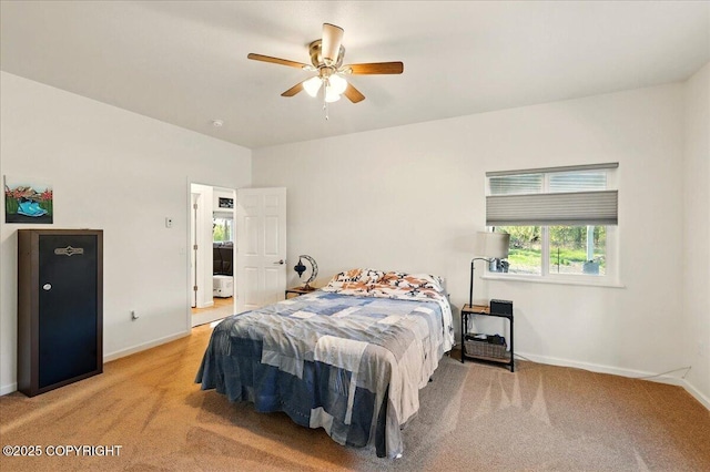 47974 Barney Ct, Soldotna, AK 99669 - bedroom with light carpet, baseboards, and a ceiling fan