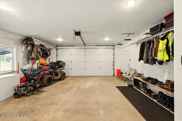 47974 Barney Ct, Soldotna, AK 99669 - garage featuring a garage door opener