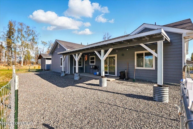 47974 Barney Ct, Soldotna, AK 99669 - back of property featuring a patio area