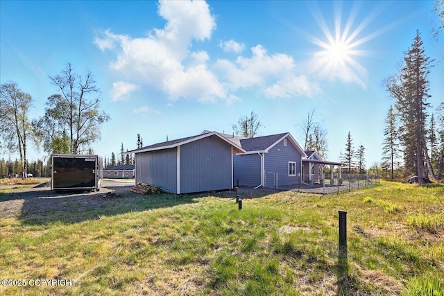 47974 Barney Ct, Soldotna, AK 99669 - view of property exterior with a lawn