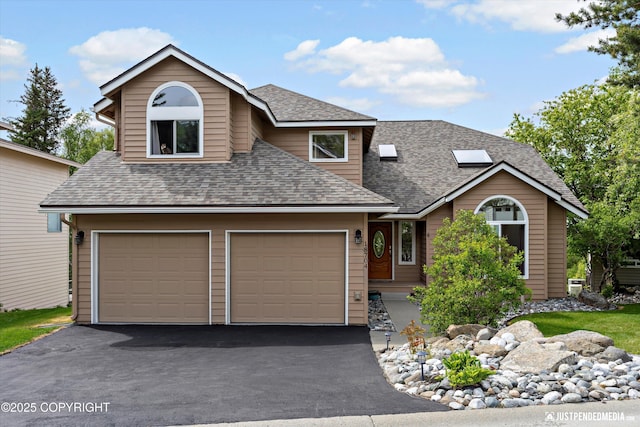 18704 Snowy Plover Cir, Anchorage, AK 99516 - view of front of home with roof with shingles and asphalt driveway