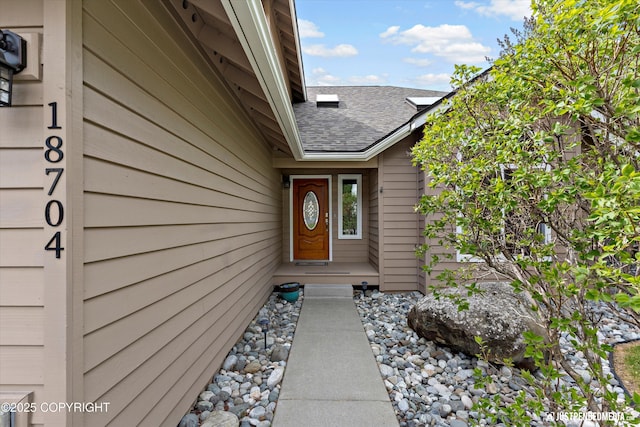 18704 Snowy Plover Cir, Anchorage, AK 99516 - doorway to property featuring roof with shingles