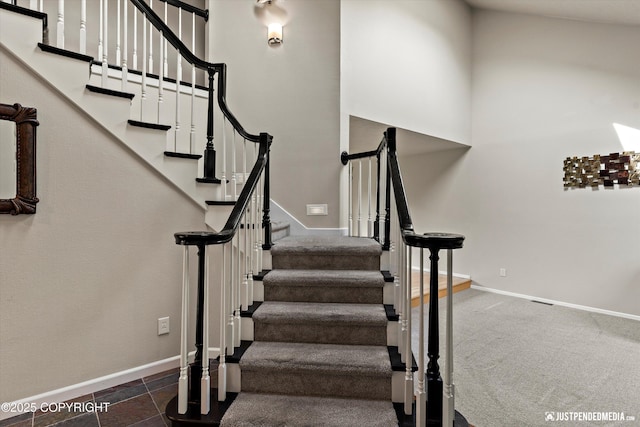 18704 Snowy Plover Cir, Anchorage, AK 99516 - stairs featuring baseboards