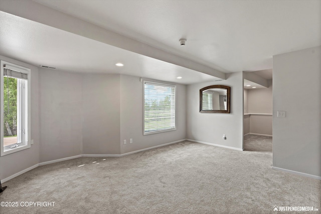 18704 Snowy Plover Cir, Anchorage, AK 99516 - carpeted empty room featuring plenty of natural light, baseboards, a smoke detector, and recessed lighting