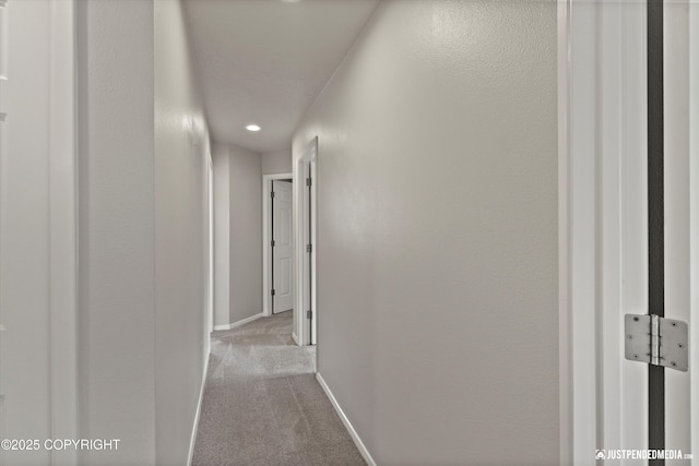 18704 Snowy Plover Cir, Anchorage, AK 99516 - hallway featuring carpet flooring, baseboards, and recessed lighting