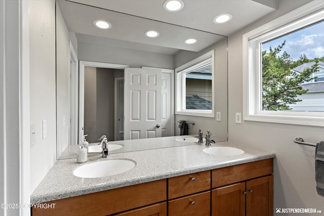 18704 Snowy Plover Cir, Anchorage, AK 99516 - bathroom with double vanity and recessed lighting