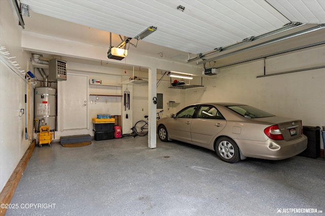 18704 Snowy Plover Cir, Anchorage, AK 99516 - garage featuring secured water heater and a garage door opener