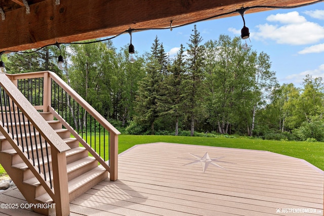 18704 Snowy Plover Cir, Anchorage, AK 99516 - wooden terrace featuring stairway and a lawn