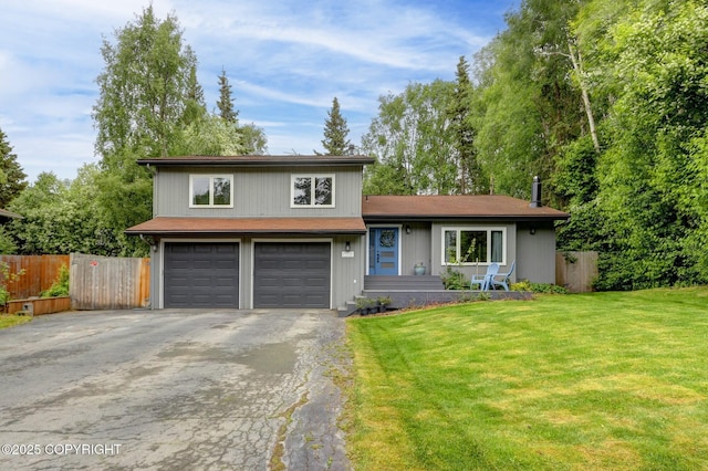 13521 Ebbtide Cir, Anchorage, AK 99516 - split level home featuring driveway and an attached garage