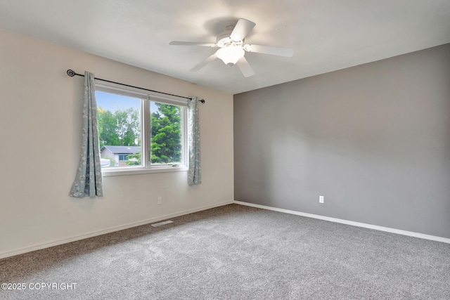 13521 Ebbtide Cir, Anchorage, AK 99516 - unfurnished room with ceiling fan, carpet floors, and baseboards