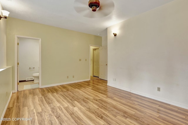 13521 Ebbtide Cir, Anchorage, AK 99516 - unfurnished room with light wood finished floors, a ceiling fan, and baseboards