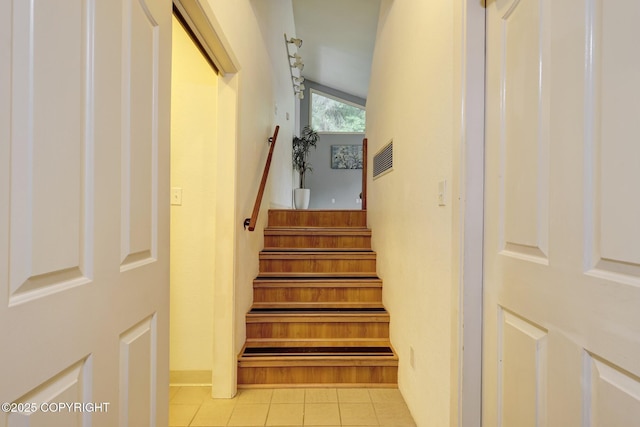 13521 Ebbtide Cir, Anchorage, AK 99516 - staircase featuring tile patterned floors