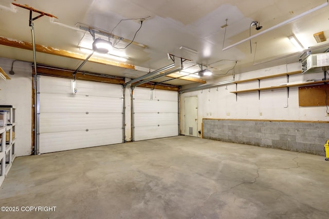 13521 Ebbtide Cir, Anchorage, AK 99516 - garage featuring a garage door opener