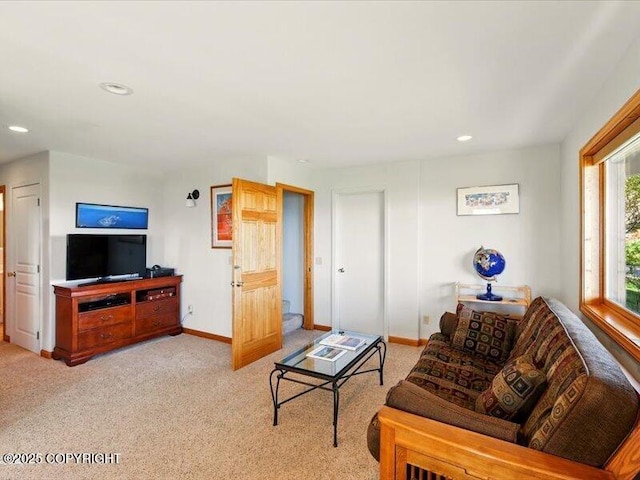 58820 E End Rd, Homer, AK 99603 - living room featuring baseboards, recessed lighting, and light carpet
