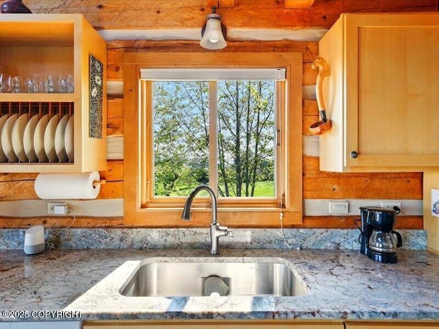 58820 E End Rd, Homer, AK 99603 - kitchen featuring a sink and light stone countertops