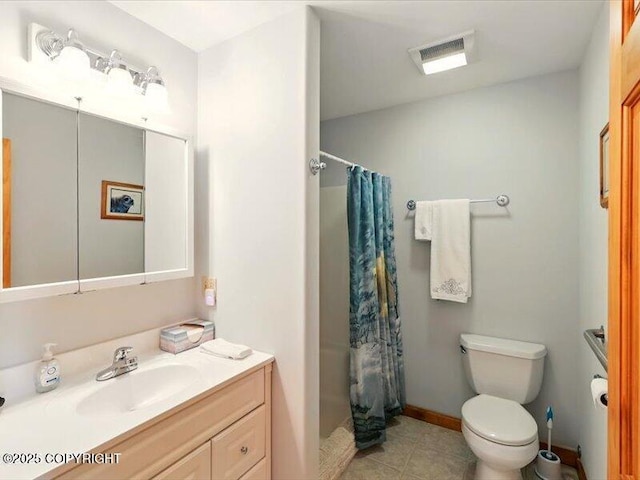 58820 E End Rd, Homer, AK 99603 - bathroom featuring vanity, toilet, a shower with curtain, and tile patterned flooring