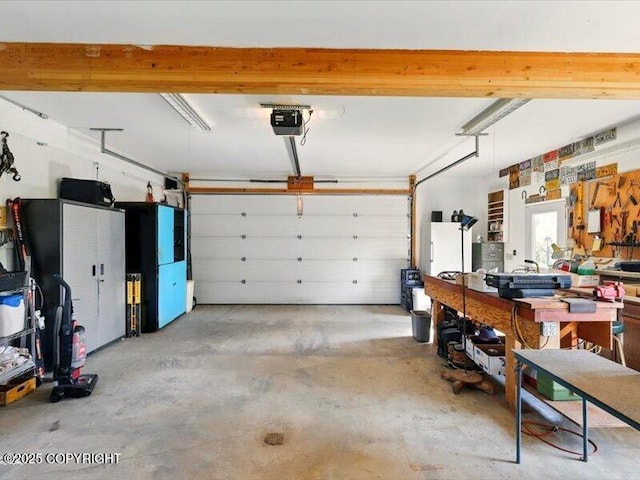 58820 E End Rd, Homer, AK 99603 - garage featuring a garage door opener