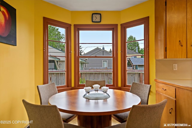 1310 G St, Anchorage, AK 99501 - dining area featuring plenty of natural light