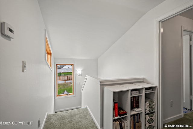 1310 G St, Anchorage, AK 99501 - corridor featuring an upstairs landing, carpet floors, baseboards, and vaulted ceiling