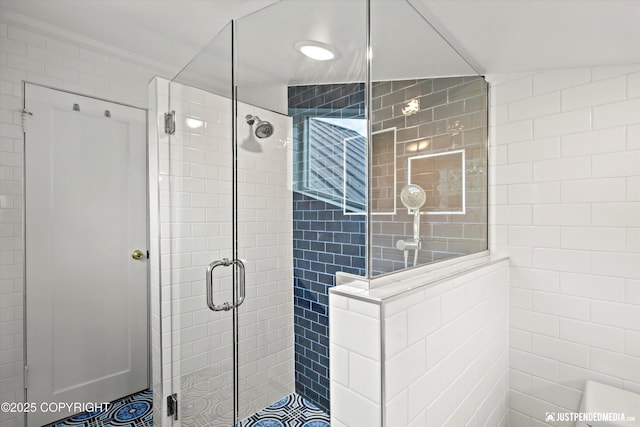 1310 G St, Anchorage, AK 99501 - full bath with a shower stall and tile walls