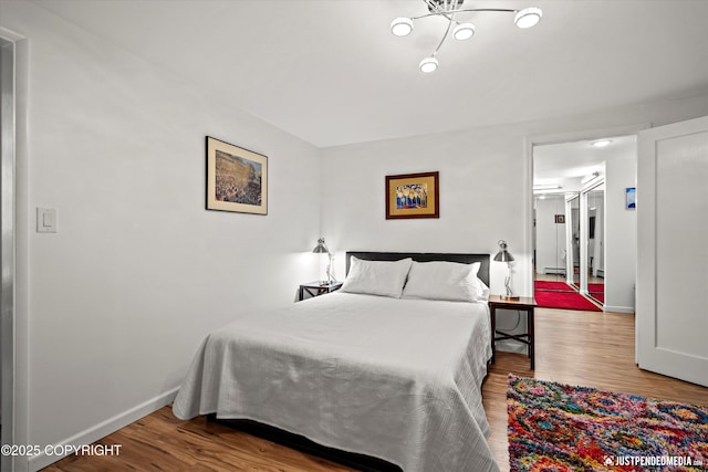 1310 G St, Anchorage, AK 99501 - bedroom with wood finished floors and baseboards