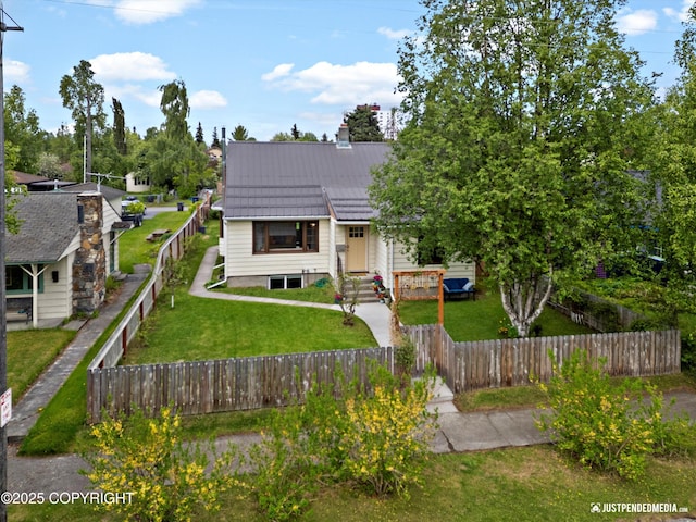 1310 G St, Anchorage, AK 99501 - view of front facade with metal roof and a chimney