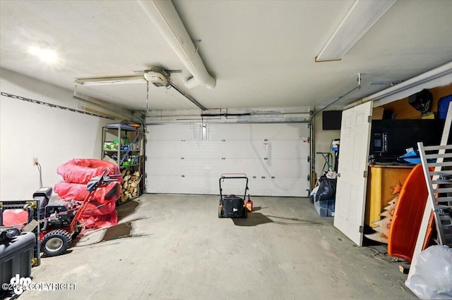 3470 W Wren St, Wasilla, AK 99623 - garage featuring a garage door opener
