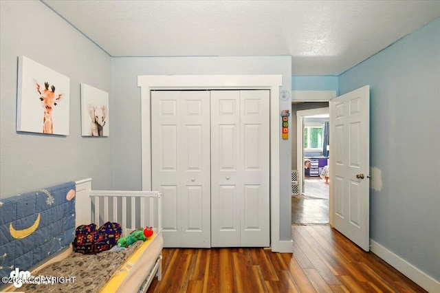 3470 W Wren St, Wasilla, AK 99623 - bedroom featuring dark wood-style floors and a closet