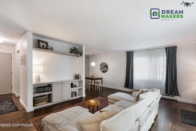 190 Grand Larry St Unit A-01, Anchorage, AK 99504 - living area with a textured ceiling and dark wood-style floors