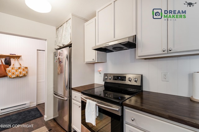 190 Grand Larry St Unit A-01, Anchorage, AK 99504 - kitchen featuring appliances with stainless steel finishes, under cabinet range hood, a baseboard radiator, wood counters, and dark wood finished floors