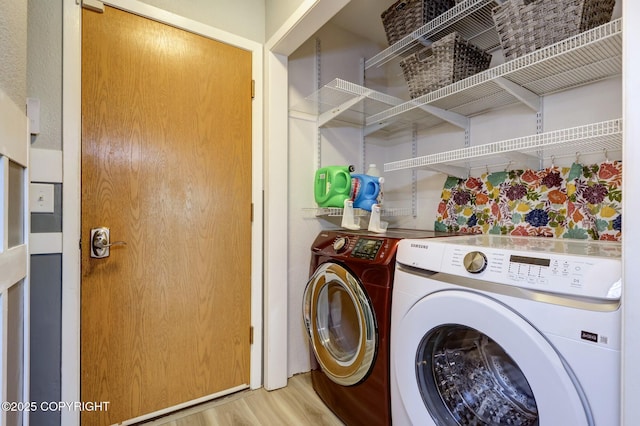 3370 Chaparral Cir, Anchorage, AK 99502 - laundry area with independent washer and dryer and light wood finished floors