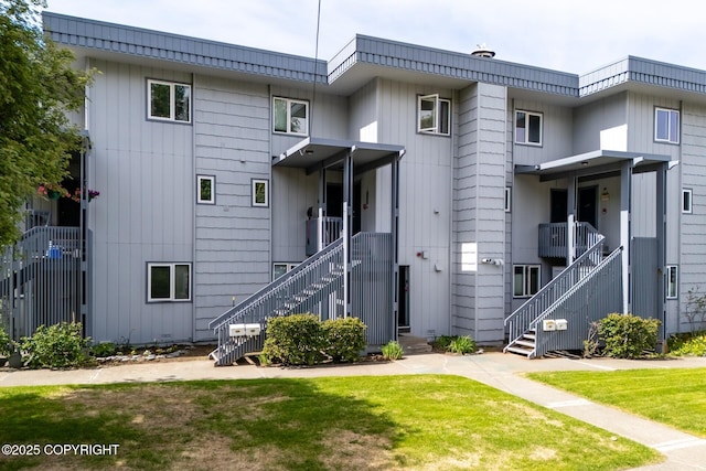 824 O Pl, Anchorage, AK 99501 - view of property with stairway