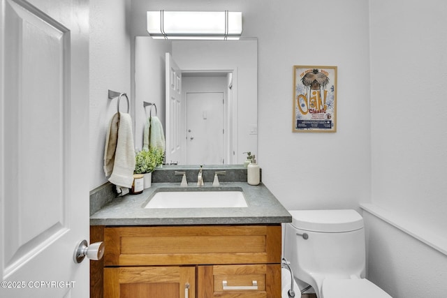 824 O Pl, Anchorage, AK 99501 - half bathroom with vanity, toilet, and a wall unit AC