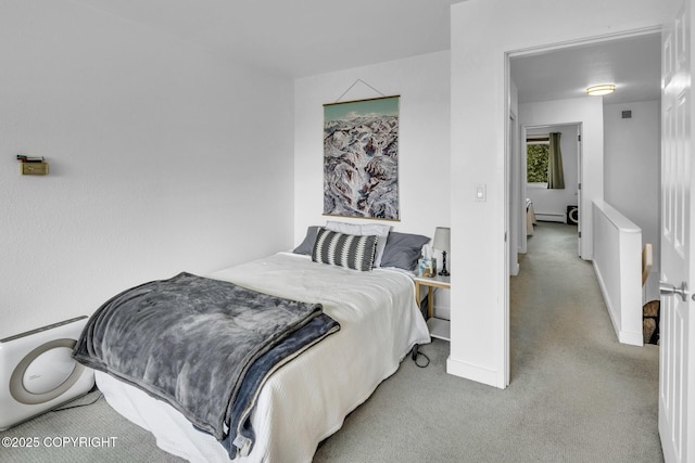 824 O Pl, Anchorage, AK 99501 - carpeted bedroom featuring baseboard heating and baseboards
