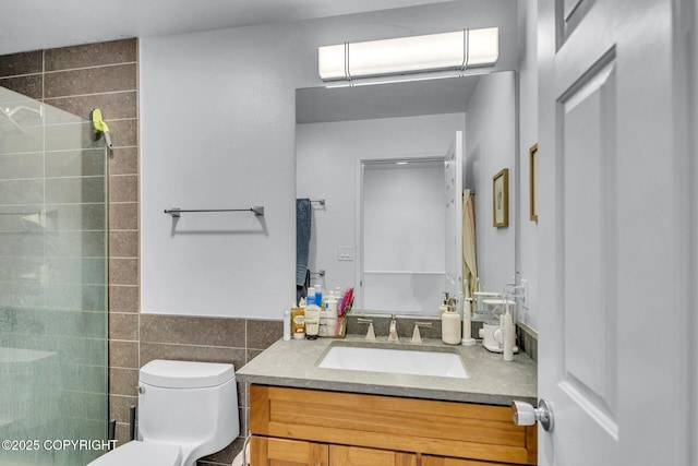 824 O Pl, Anchorage, AK 99501 - bathroom with vanity, toilet, tile walls, a tile shower, and an AC wall unit