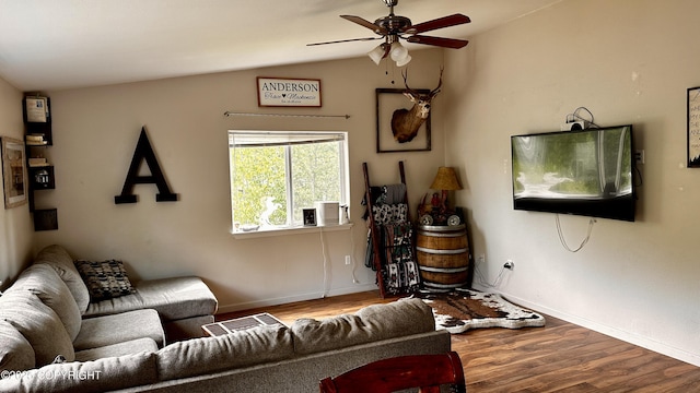 7191 S Yohn Bay Pl, Wasilla, AK 99623 - living room with ceiling fan, wood finished floors, vaulted ceiling, and baseboards