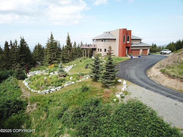 16971 Mount Mckinley View Dr, Anchorage, AK 99516 - view of side of home featuring asphalt driveway