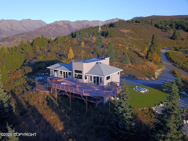 16971 Mount Mckinley View Dr, Anchorage, AK 99516 - view from above of property featuring a forest and a mountain backdrop