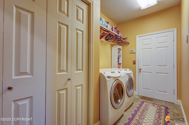 16971 Mount Mckinley View Dr, Anchorage, AK 99516 - laundry room featuring washing machine and clothes dryer and baseboards