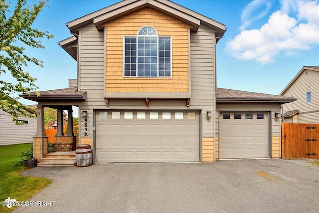 5846 Grand Teton Loop, Anchorage, AK 99502 - view of front of property featuring asphalt driveway and a shingled roof