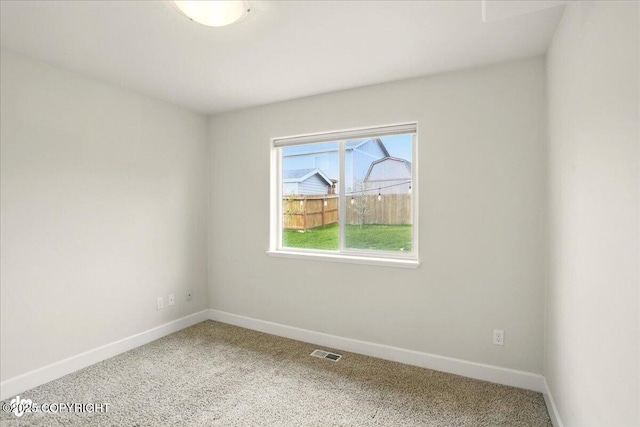 5846 Grand Teton Loop, Anchorage, AK 99502 - carpeted spare room with baseboards