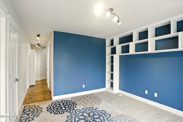 5846 Grand Teton Loop, Anchorage, AK 99502 - unfurnished bedroom featuring baseboards