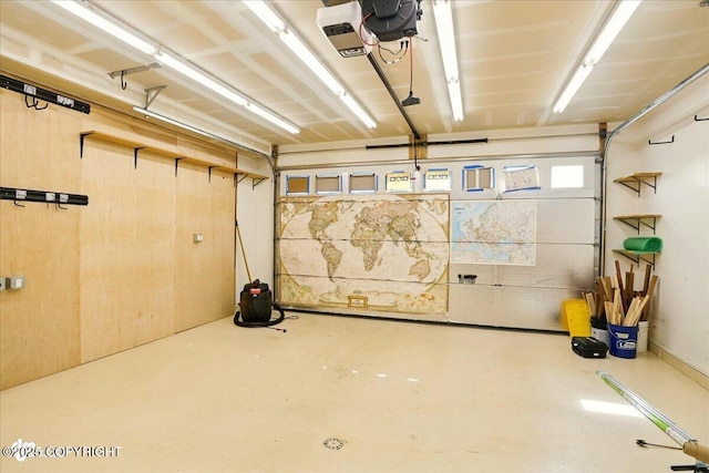 5846 Grand Teton Loop, Anchorage, AK 99502 - garage featuring a garage door opener