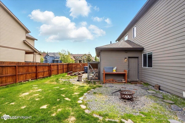 5846 Grand Teton Loop, Anchorage, AK 99502 - view of yard featuring an outdoor fire pit