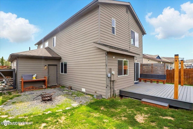 5846 Grand Teton Loop, Anchorage, AK 99502 - rear view of property with a fire pit and a deck