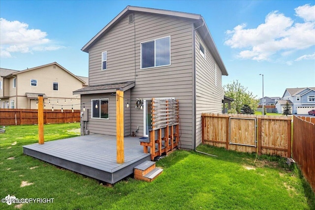 5846 Grand Teton Loop, Anchorage, AK 99502 - rear view of house featuring a deck