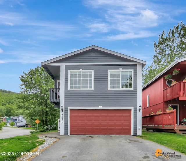 17480 Beaujolais Cir, Eagle River, AK 99577 - traditional-style house featuring driveway and a garage