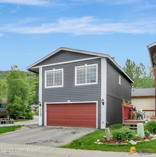 17480 Beaujolais Cir, Eagle River, AK 99577 - view of front of home with a garage and driveway