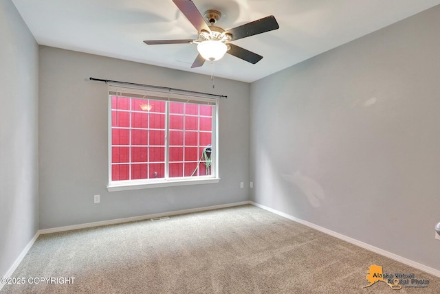 17480 Beaujolais Cir, Eagle River, AK 99577 - carpeted spare room featuring ceiling fan and baseboards