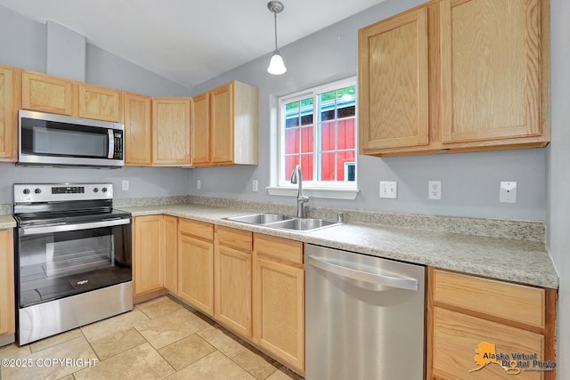 17480 Beaujolais Cir, Eagle River, AK 99577 - kitchen featuring stainless steel appliances, light brown cabinets, a sink, light countertops, and lofted ceiling